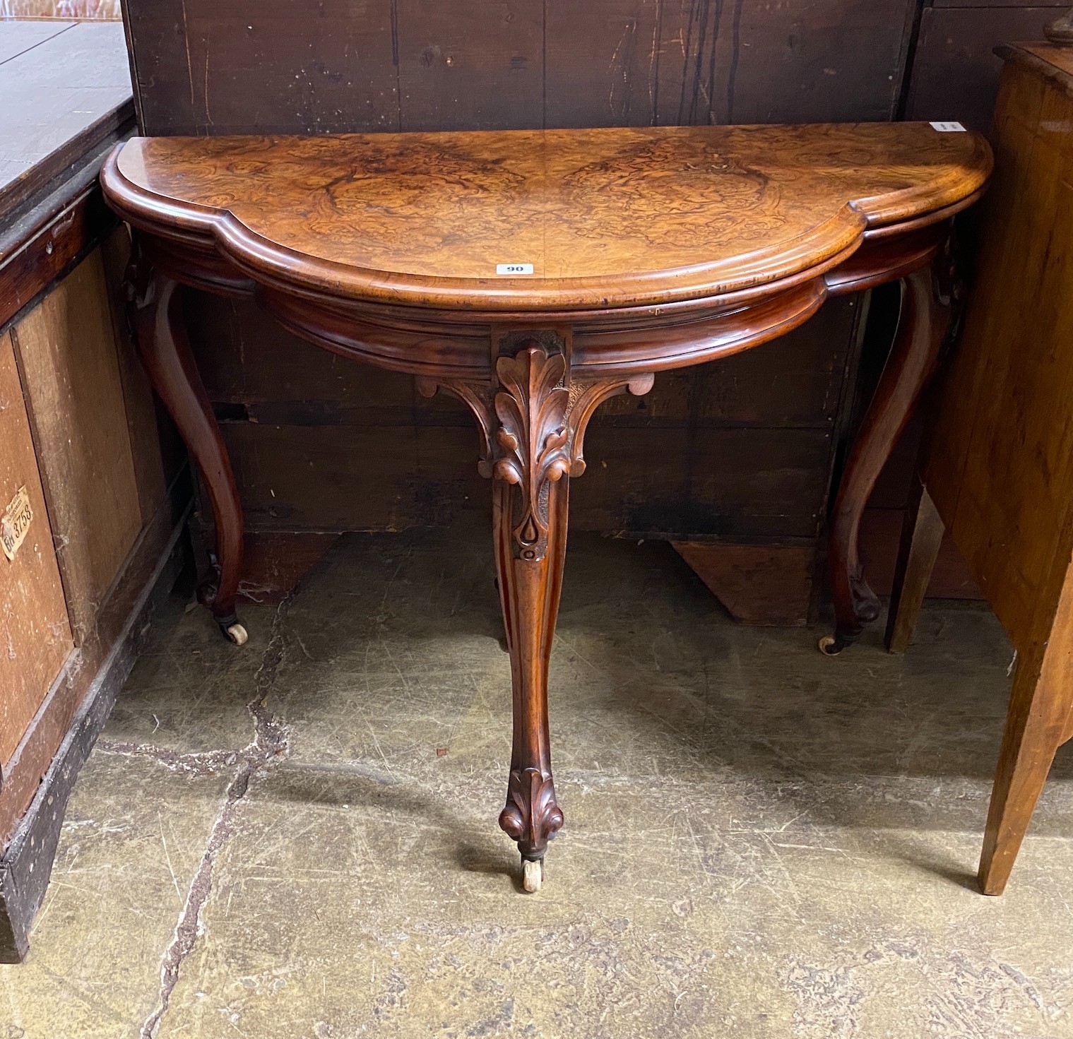 A Victorian figured walnut D shaped folding card table, width 100cm, depth 51cm, height 74cm